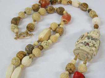 Ivory and Coral Necklace with Woman Shaped Netsuke